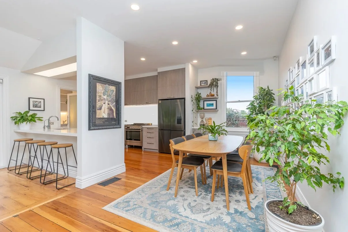 Dining room of a Mount Eden villa with a sash window
